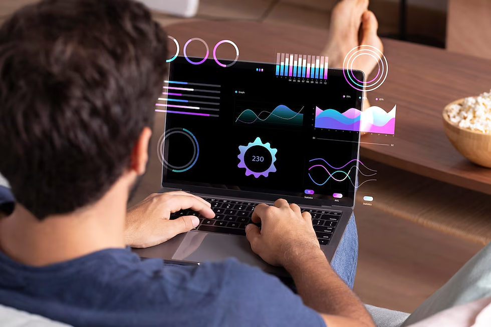 A person sitting relaxed on a couch, looking at a laptop displaying colorful data visualizations and graphs, with various circular and line data elements floating on the screen.