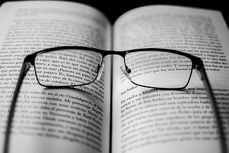 framed_eyeglasses_on_book_pages-scopio-bd4f5482-6983-4fc0-9d98-5d9bc6e2fd13 (1).jpg