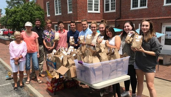 Handing out the goody bags during exam week.