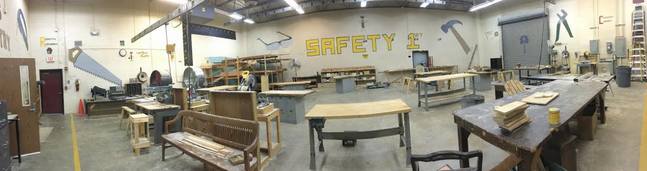 BC carpentry build to graduation platforms; several Airport students in class