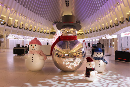 Large holiday snowman sculptures fabricated by Murmuration installed at the Oculus World Trade Center in New York