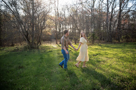 Couple in love, walking. through field.