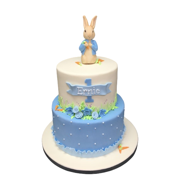 Bespoke Peter Rabbit cake with hand-painted characters and floral decorations, crafted in Solihull, West Midlands.