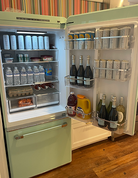 Fully stocked fridge in luxury Charleston VRBO vacation rental by Bienvenue Charleston
