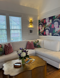 Relaxing and stylish colorful living room in the Royal Cottage at Casa Zoe, perfect for Charleston visitors
