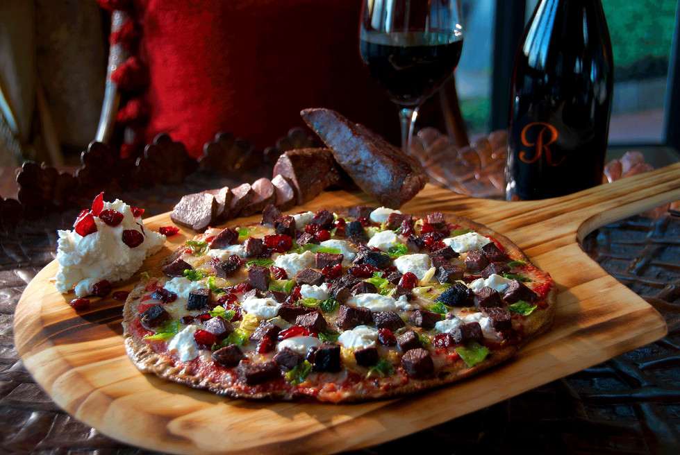 Venison pizza with goat cheese