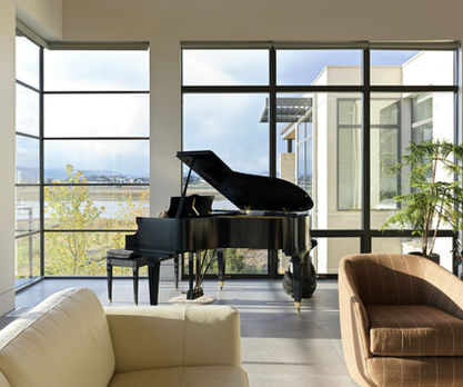 modern custom home golf course living piano room