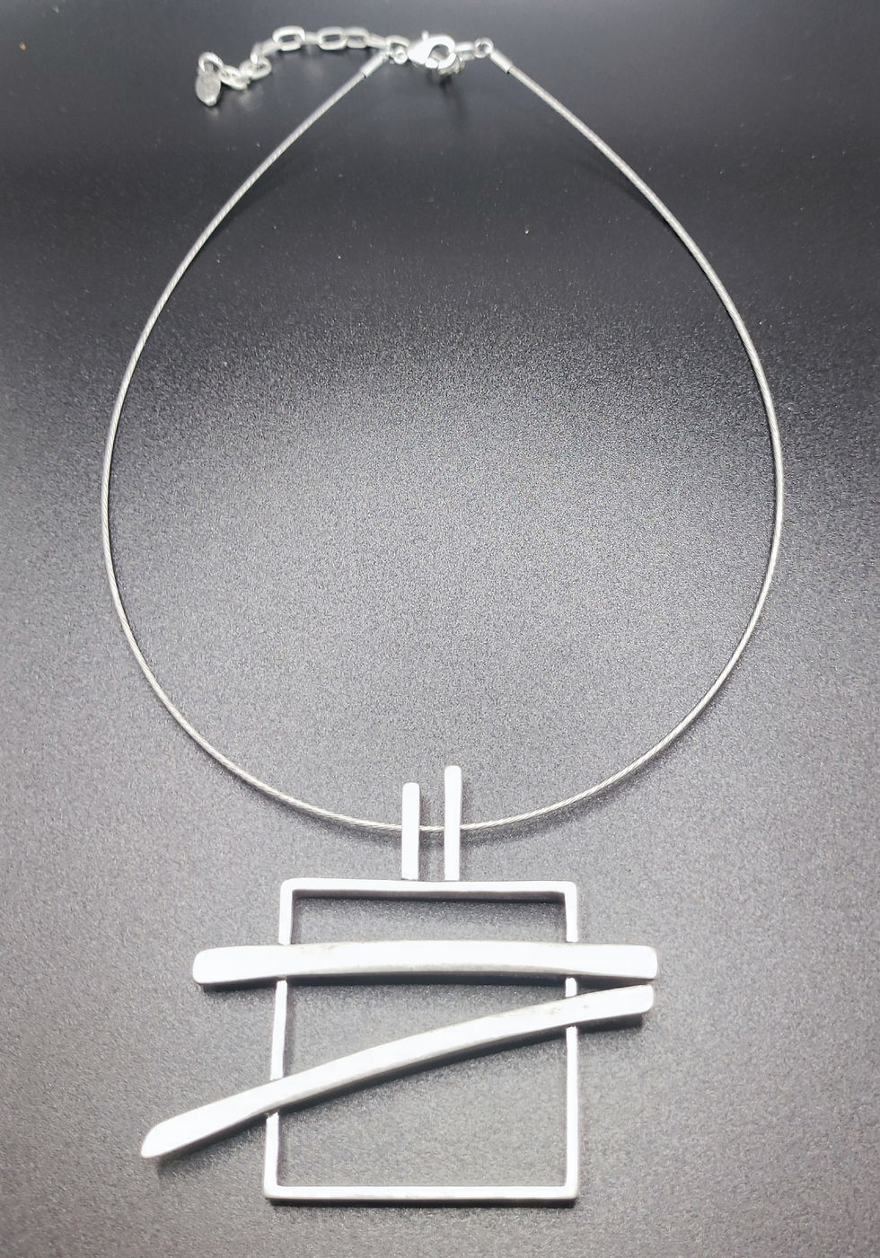 Thumbnail: Arrow Square ketting