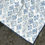 Thumbnail: white and blue geometric sofia cove baby splash mat play mess clean toddler weaning