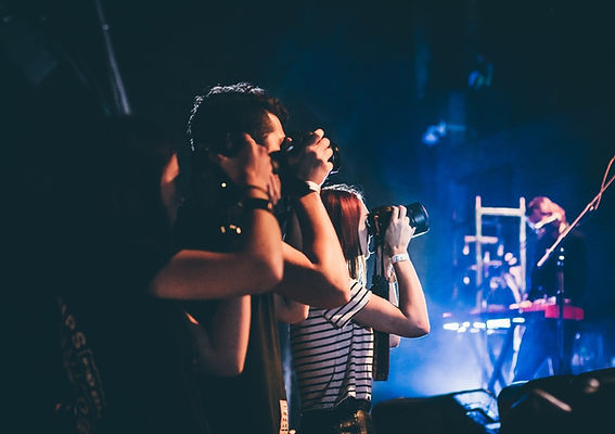 Music Photographers At A Concert