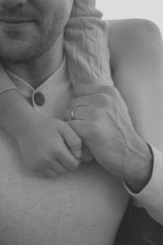 dad holding his daughter's hand during a fall family photo session in charlottesville virginia