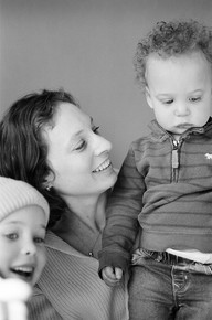 mom looks at young son