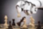 chessboard with chess pieces and robot hand
