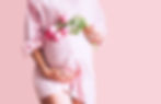 Pregnancy, Motherhood, Mother's Day Holiday concept. Young woman in maternity shirt dress 