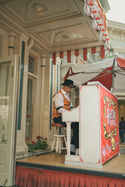 Disney Ragtime Piano Player - moody vintage tones, main street USA 