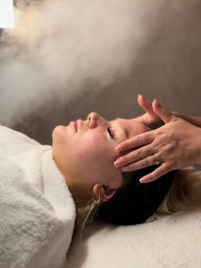 Relaxing facial with LED light therapy at a modern clinic in Leeds