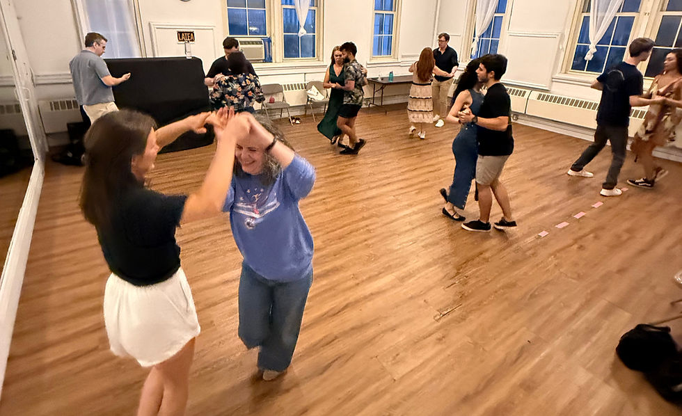 Students dance in pairs in a studio during a regular Forró New York class in New York City.