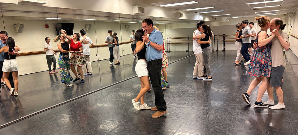 Participants practicing partner movements during the 2025 Philadelphia workshop with Fiona Ladybird.