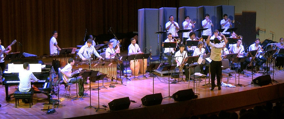 Conducting and presenting original music with large ensemble performers at the Frost School of Music, University of Miami.