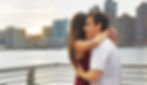 Close-up of Rafael dancing forró in a close embrace with his partner Carol at sunset, with the Manhattan skyline in the background, illustrating connection and intimacy in the dance.