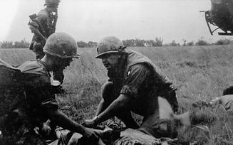 Edited - Mittemeyer_Bernie treating a wounded soldier in Vietnam.jpg
