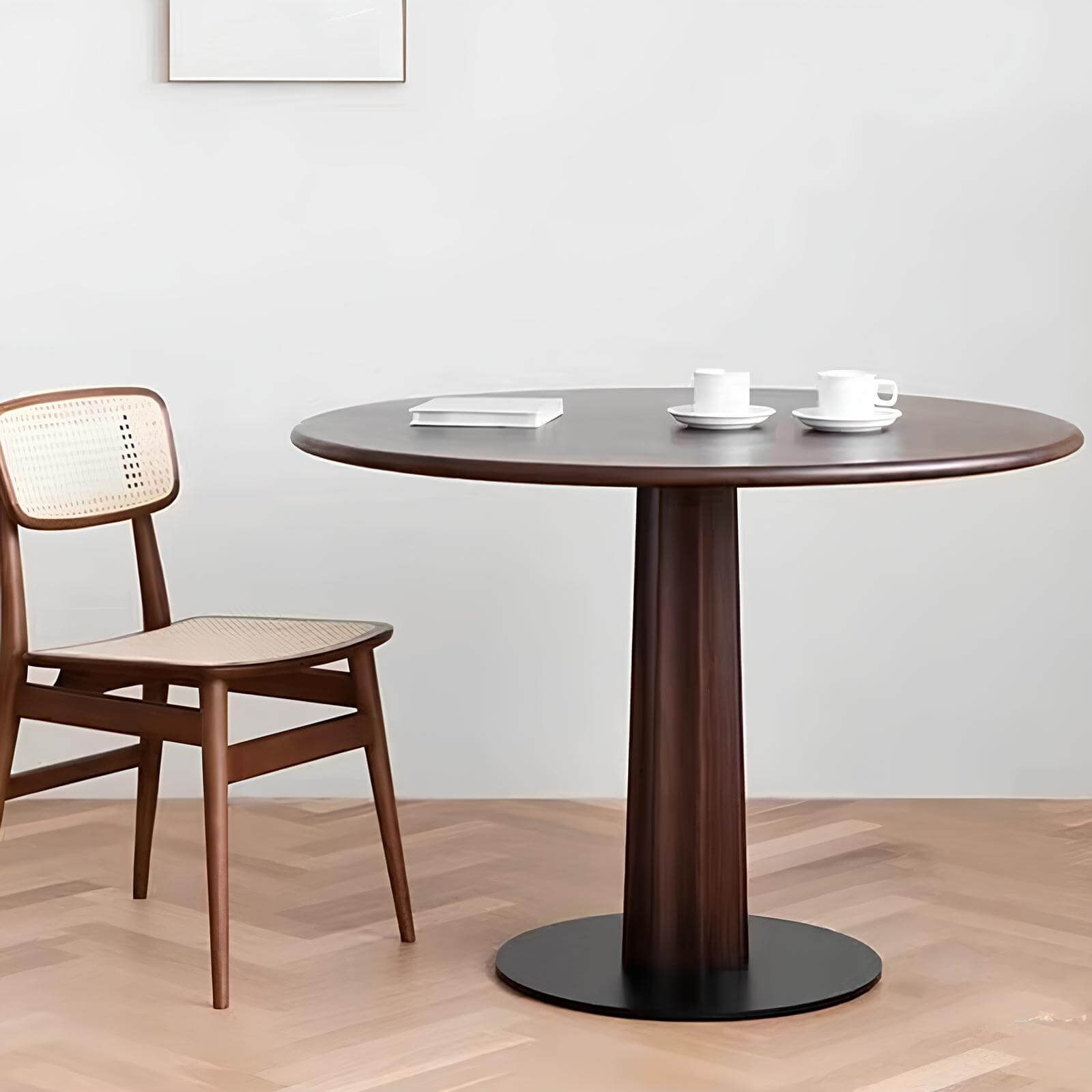 Round Black Walnut Dining Table in the Room