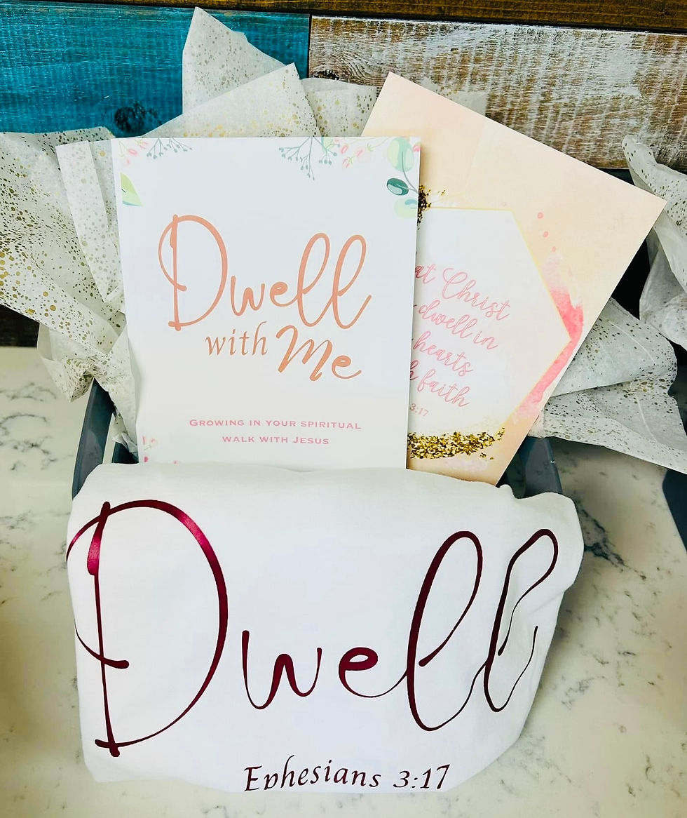 Ladies devotional books and a t-shirt in a gift basket