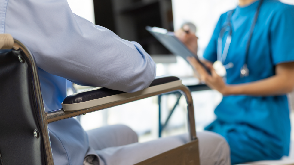 female-doctor-examining-a-wheelchair-patient-in-an-2026-03-24-09-11-27-utc 2
