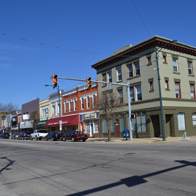 Within German Township in Indiana, Bremen’s historic resources collectively reflect late 19th- and early 20th-century railroad-era growth through cohesive brick commercial blocks, tree-lined residential streets with varied revival and vernacular architecture, and prominent civic and infrastructure landmarks constructed between the 1860s and mid-20th century.