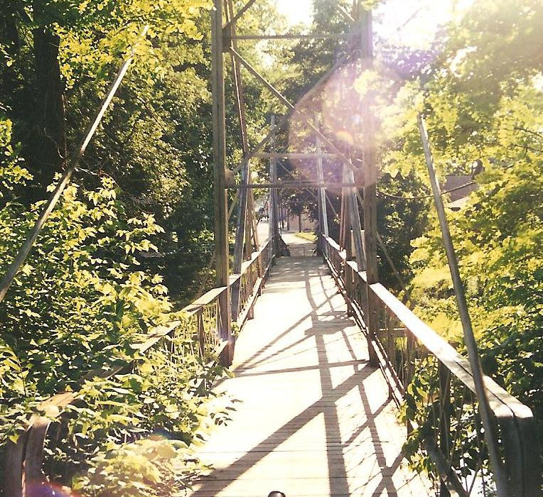 The East LaPorte Street Footbridge in Plymouth, Indiana, built in 1898 by the Rochester Bridge Company, is a historic wrought-iron pedestrian bridge spanning the Yellow River, long serving as a vital link between the eastside residential neighborhood and downtown and recognized as the oldest extant pedestrian bridge in Indiana.