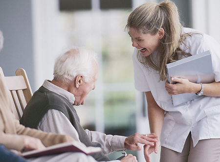 Laughing lady with elderly man