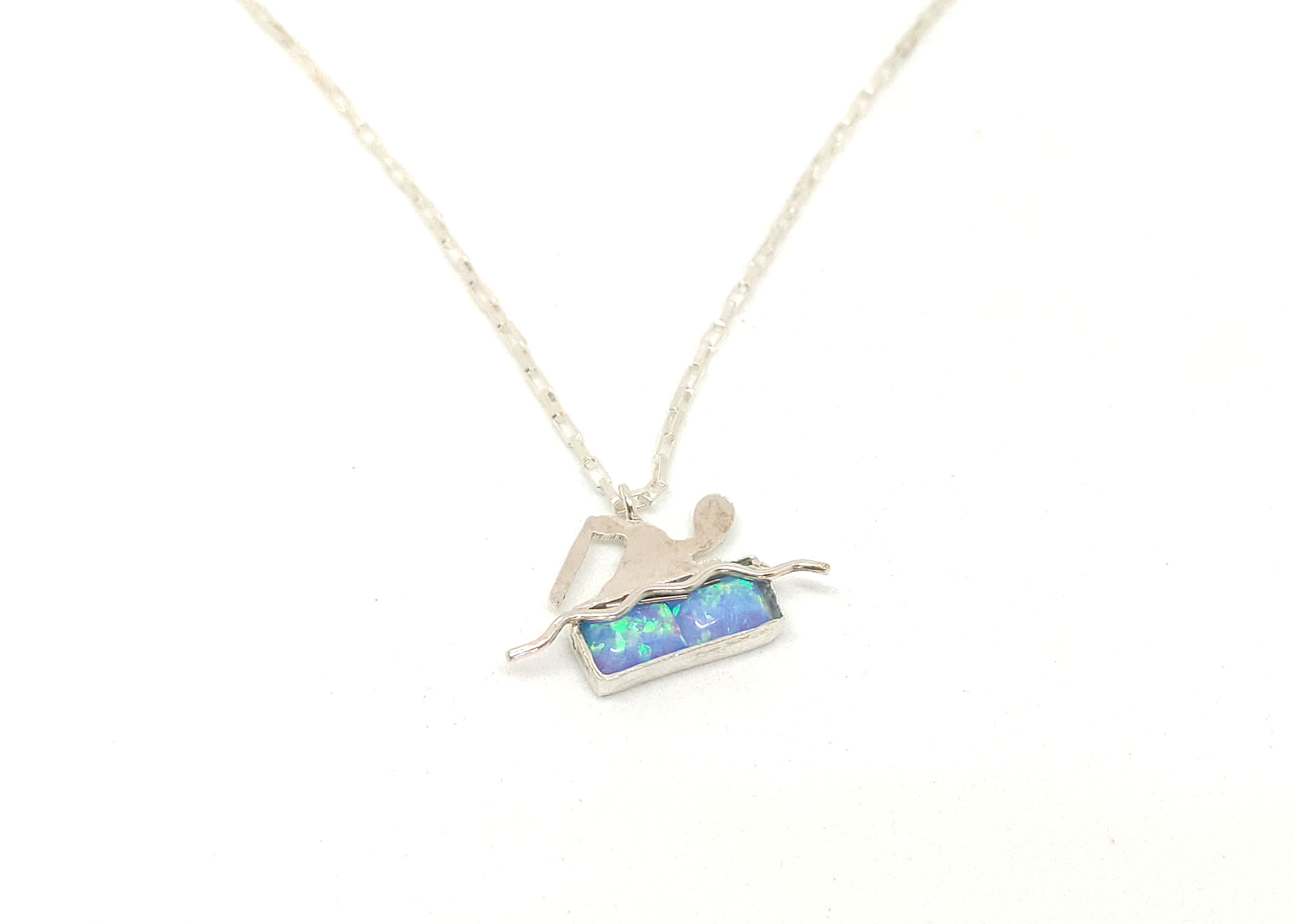Delicate and beautiful silver andblue opal stone swimming necklace suitable for