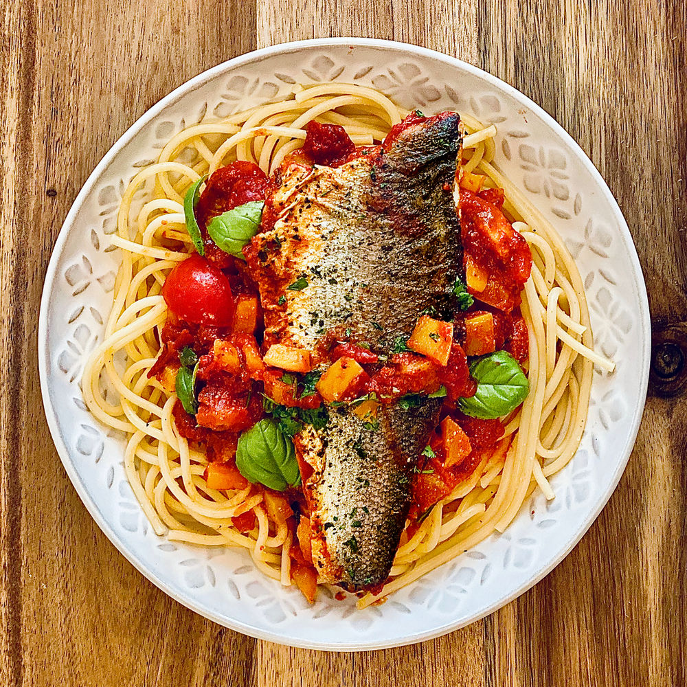 Easy One Pan Mediterranean Style Sea Bass with Tomatoes and Bell Peppers