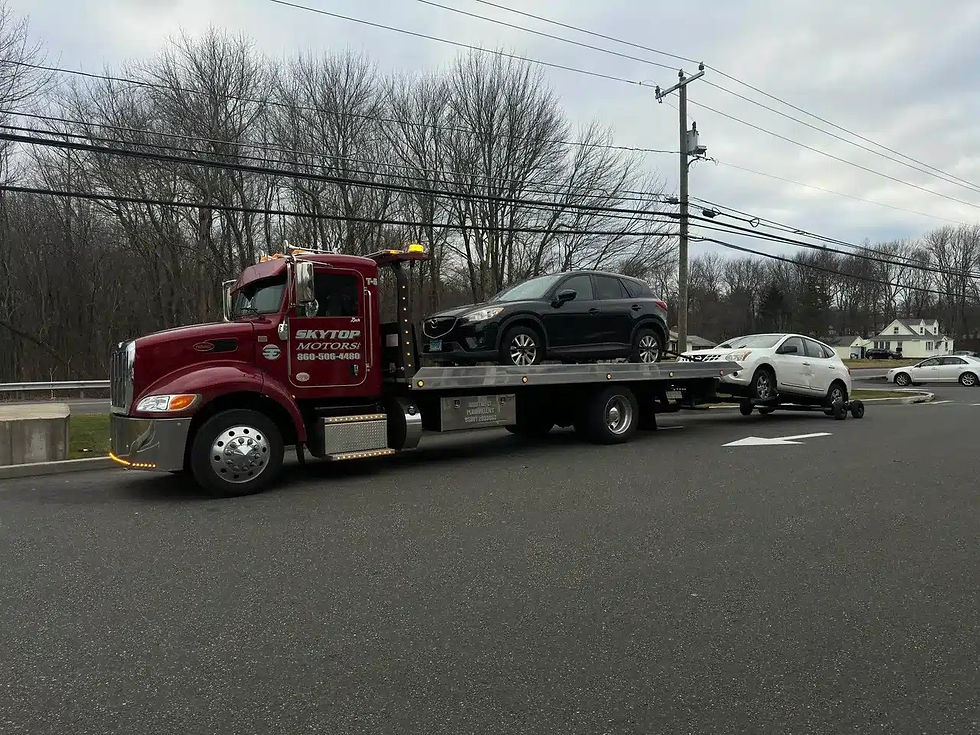 24/7 light, medium, and heavy-duty towing with accident recovery and roadside help by Skytop Towing & Recovery LLC in CT