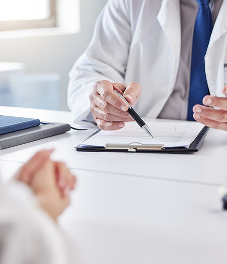 Hands, doctor and patient with consultation in clipboard for medical history, information