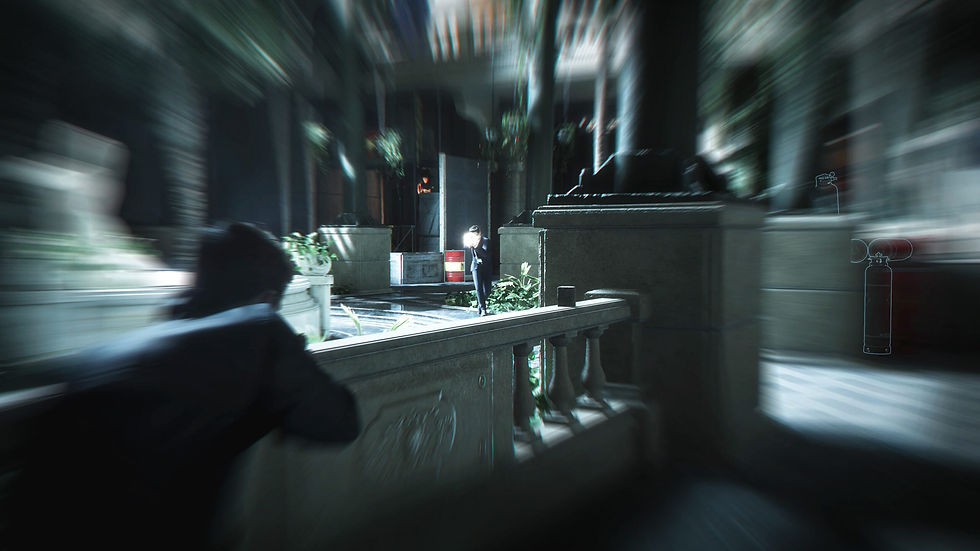 Person crouched behind balcony in dim, blurred setting; another stands in distance with glowing light. Potted plants and a red canister are visible.