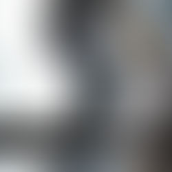 Two characters in rain; one with a flashlight, both serious. Background features building silhouette. Text: "Dapper Tux x Resident Evil: Requiem."