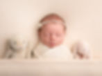 Sleeping infant in a newborn and family portfolio gallery.