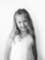 Smiling personality child portrait photography of a young girl