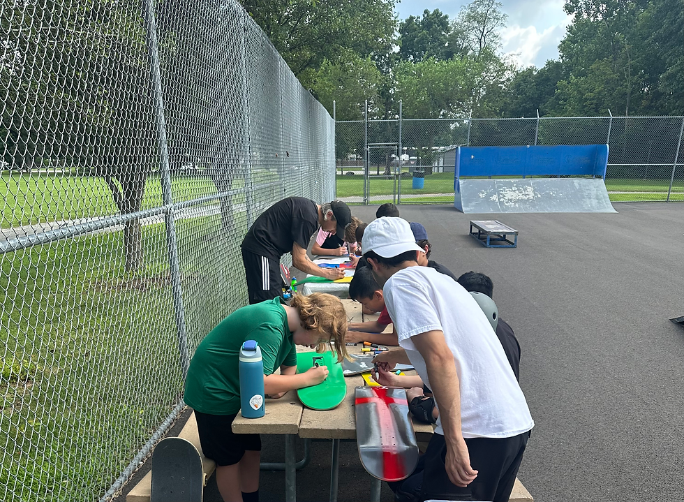 Summer Skateboard Camp with connect skateboarding. Kids making their own custom skateboard.