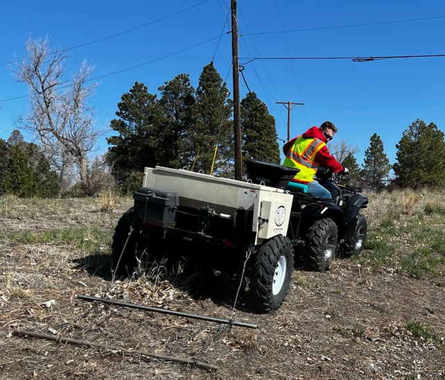 Employee performing seeding treatment