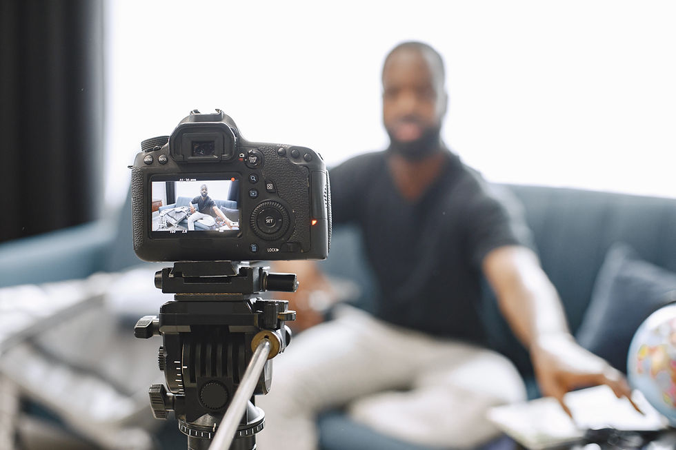 man-recording-video-on-camera-at-home-2026-03-17-05-50-23-utc.jpg