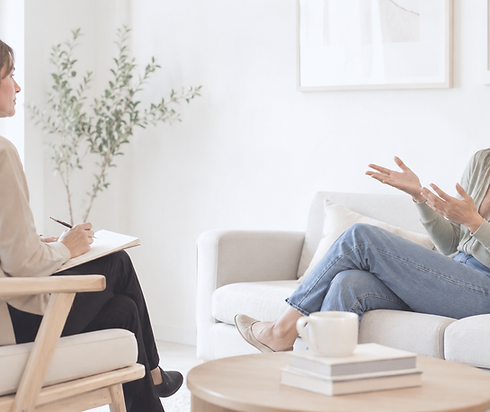 Therapist and client during an in-person counseling session at Evans Counseling Group in Denver, Colorado.