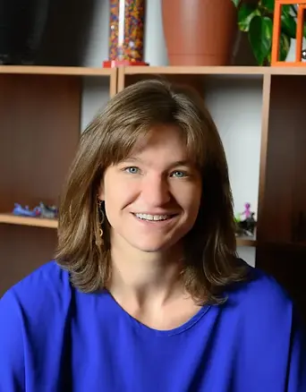 Portrait of Sasha Silberman, MSW, LSW, therapist at Evans Counseling Group specializing in children, adolescents, anxiety, emotional regulation, and school-related concerns.