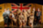 Performers onstage in a production of Black Adder Goes Forth