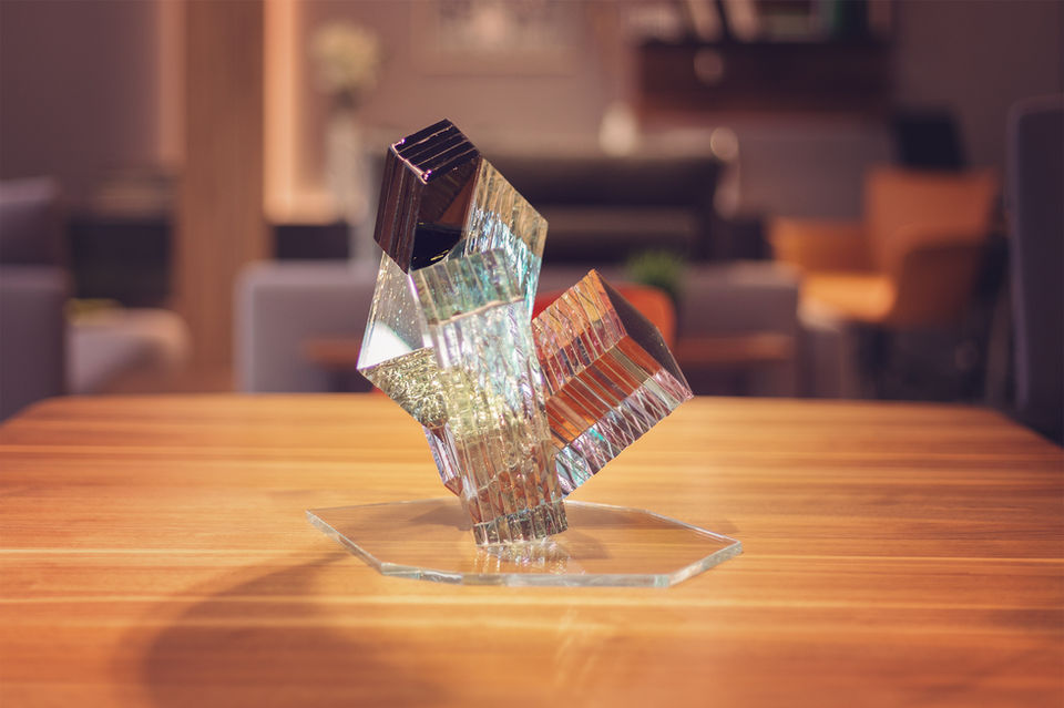 Colorful table-size layered glass artwork, glass in interior design, modern stacked glass art sculpture, decorations in aesthetic contemporary interior, Agrit by glass artist Ernest Vitin