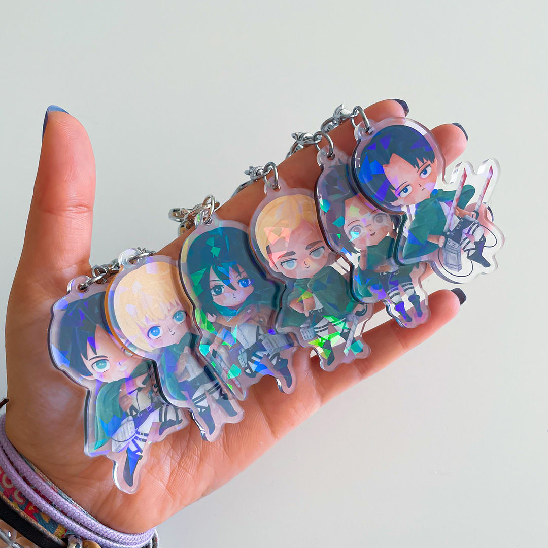 Llaveros acrílicos holográficos chibis exploradores