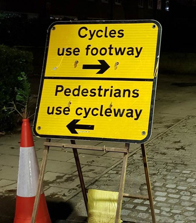 Funny pictures cycles and pedestrian sign mix up