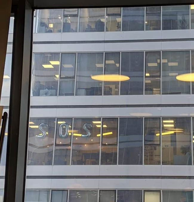 Funny pictures neighboring office SOS