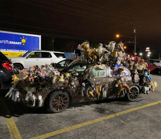 Funny pictures toys stuck all over car